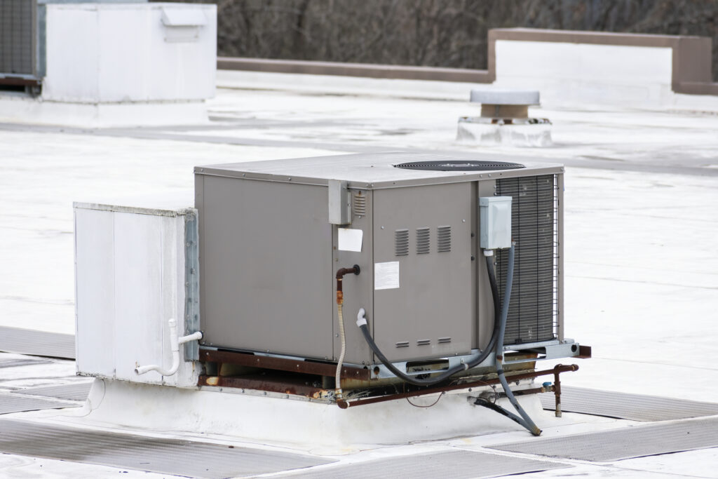 Horizontal shot of a commercial rooftop HVAC unit.